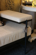 Linen and Black Bench