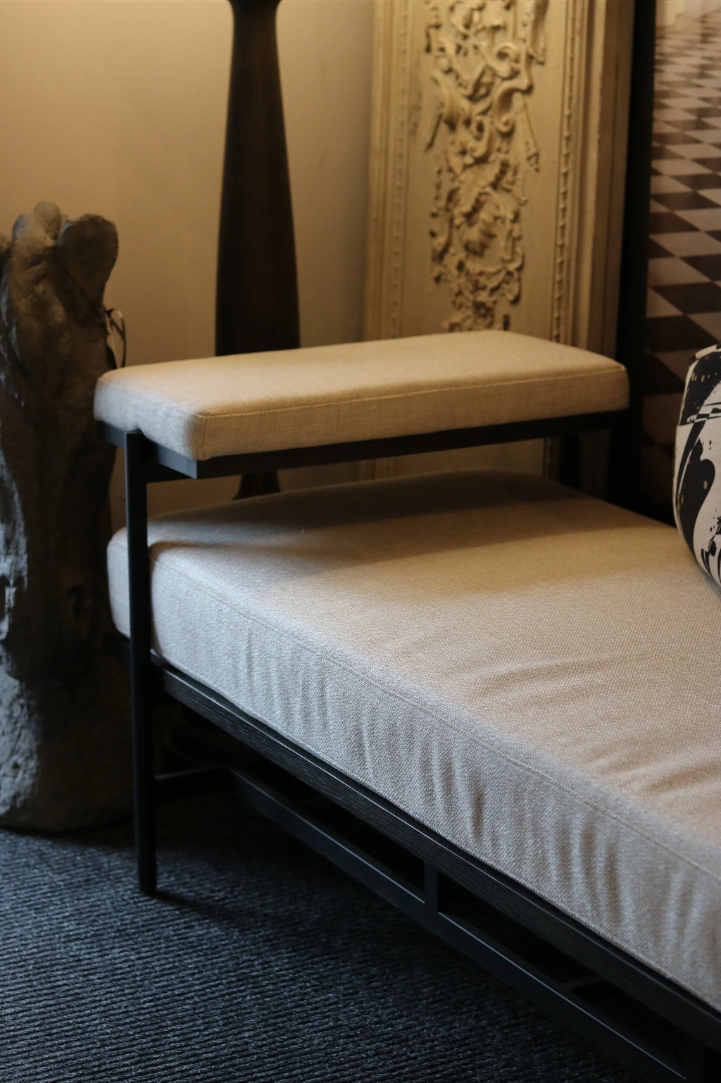 Linen and Black Bench