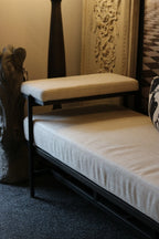 Linen and Black Bench