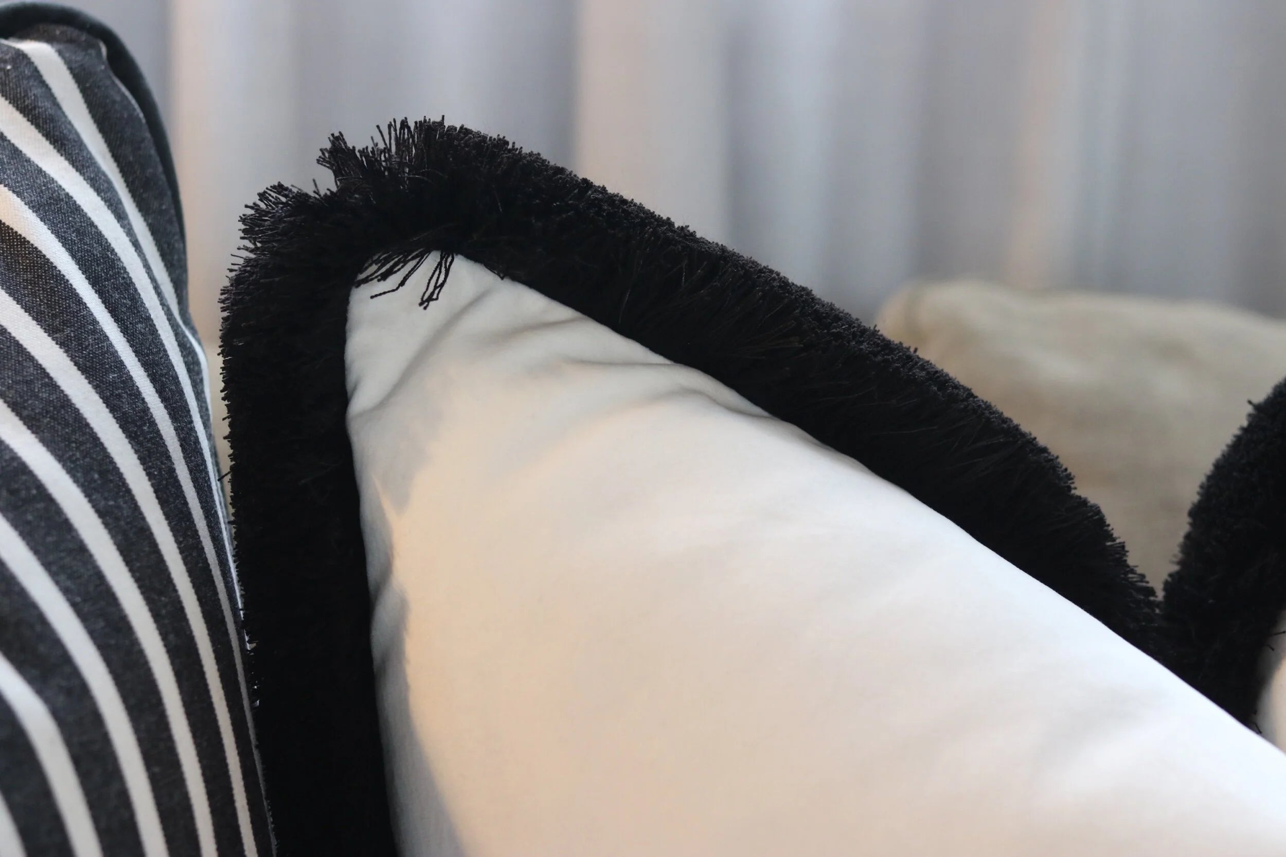 White Cushion with Fringe