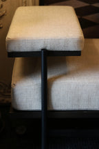 Linen and Black Bench