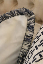 White Flat Velvet Cushion with Andrew Martin Navy ‘Moscow Mule’ Fringe