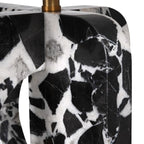 Black and white marble vase with a gold base